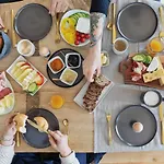 Holzhackerin - The Charming Haus Am Berg Aparthotel Schladming