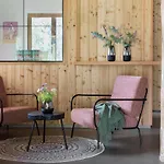 Aparthotel Holzhackerin - The Charming Haus Am Berg