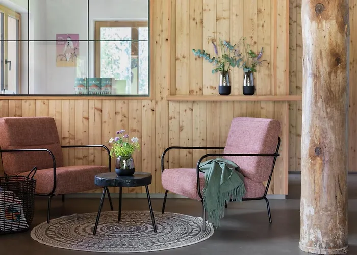 Aparthotel Holzhackerin - The Charming Haus Am Berg